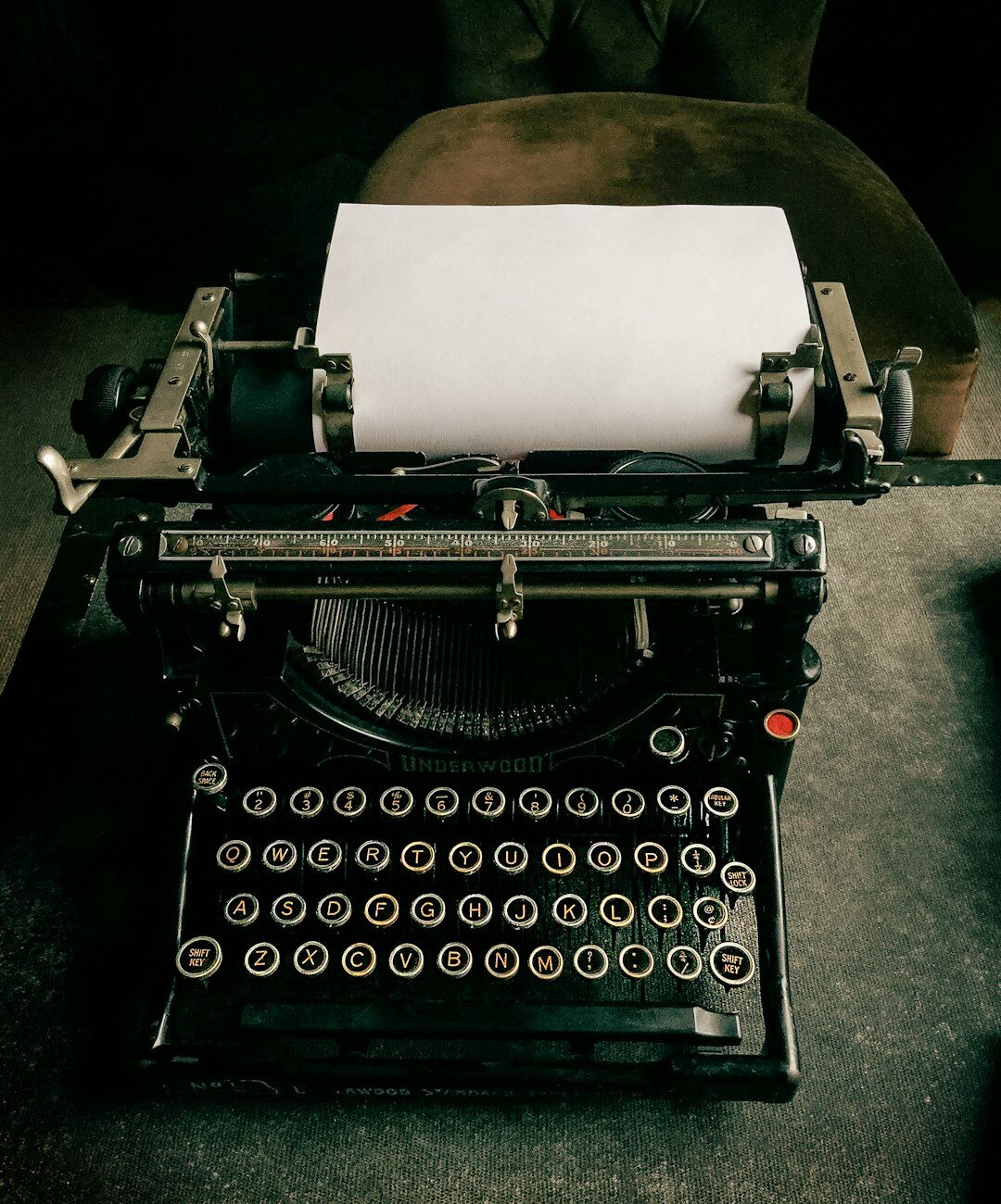 modern crime writer typing