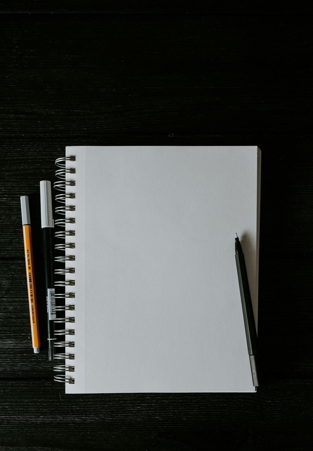 writer notebook with pen